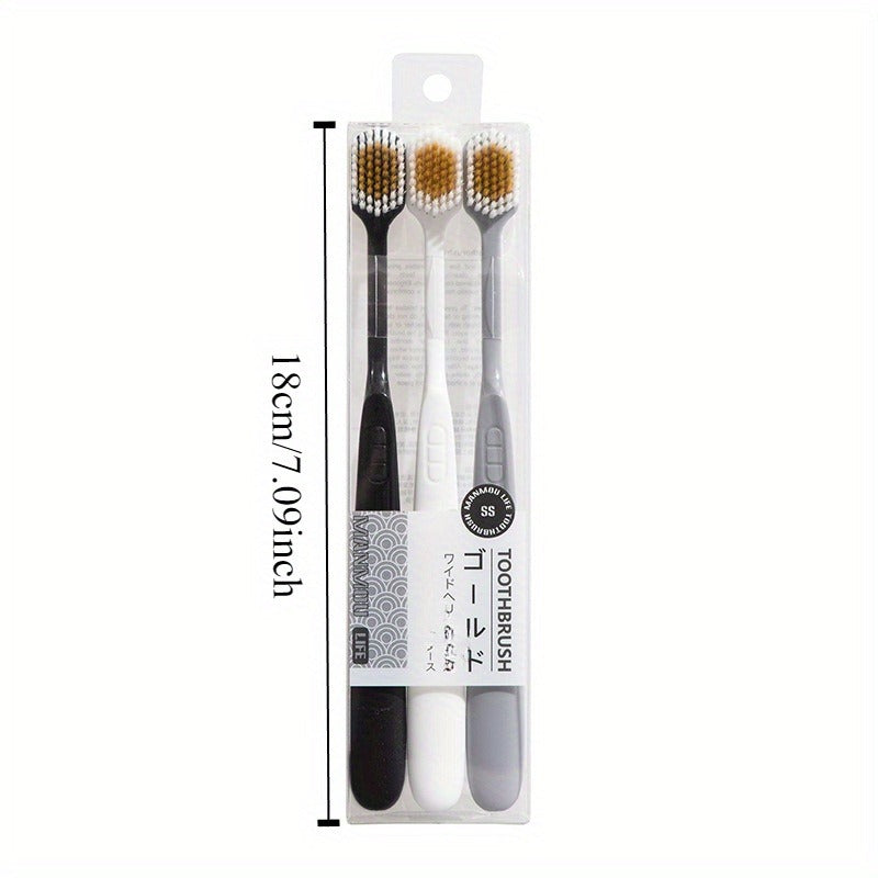 Set of Three Ultra-Soft Bristle Toothbrushes with a Wide Head, Ideal for Adult Use. The Design Helps in Effectively Eliminating Plaque While Being Gentle on Sensitive Teeth And Gums. Offered in Black, White, And Gray Colors with an Ergonomic Handle